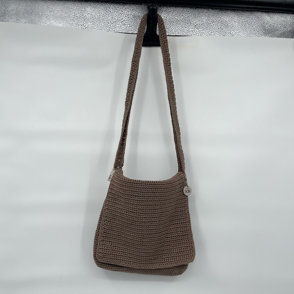 The Sak taupe weaved knit crossbody shoulder bag